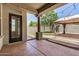Covered back patio with outdoor access and gazebo in the yard for entertaining guests at 4258 E Lexington Ave, Gilbert, AZ 85234