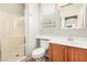 This bathroom features a single sink vanity, a toilet, a shower, and a tub at 4258 E Lexington Ave, Gilbert, AZ 85234