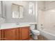 This bathroom features a single sink vanity, a toilet, and a shower/tub combo at 4258 E Lexington Ave, Gilbert, AZ 85234