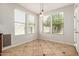 Bright dining area with tile floors and large windows overlooking the backyard at 4258 E Lexington Ave, Gilbert, AZ 85234
