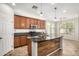 Stylish kitchen featuring stainless appliances, granite countertops, and a breakfast bar at 4258 E Lexington Ave, Gilbert, AZ 85234