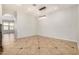 Bright living room showcasing tiled floors and modern lighting at 4258 E Lexington Ave, Gilbert, AZ 85234