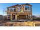 Two-story home under construction featuring a framed elevation with visible beams and window openings at 4288 E Kolin Ln, San Tan Valley, AZ 85143