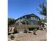 The home's backyard features lush landscaping and a sturdy fence, creating a private outdoor oasis at 4490 S Montana Dr, Chandler, AZ 85248