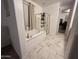 Bright bathroom featuring a tub, and shower at 4490 S Montana Dr, Chandler, AZ 85248