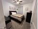 Charming bedroom features a dark wood bed with matching furniture at 4490 S Montana Dr, Chandler, AZ 85248