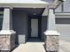 Inviting front entryway featuring stone accents and a neutral color scheme, leading to the main entrance at 4490 S Montana Dr, Chandler, AZ 85248