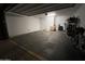 Attached two-car garage featuring neutral paint, garage door opener, and plenty of room for cars and storage at 4490 S Montana Dr, Chandler, AZ 85248