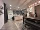Open floor plan with dining area and a glimpse of the modern kitchen at 4490 S Montana Dr, Chandler, AZ 85248