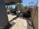Covered tile patio with pillars, BBQ and desert landscaping at 4490 S Montana Dr, Chandler, AZ 85248
