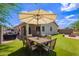 Outdoor dining set situated on an artificial lawn, perfect for entertaining at 4518 W Carson Rd, Laveen, AZ 85339