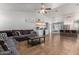 Bright living room features an open floor plan and custom coffee bar with beverage fridge at 4518 W Carson Rd, Laveen, AZ 85339
