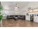 Spacious living room with vaulted ceiling, ceiling fan, and tile flooring throughout at 4518 W Carson Rd, Laveen, AZ 85339