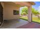 Covered patio offering a view of the backyard and a rod iron fence at 4518 W Carson Rd, Laveen, AZ 85339