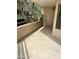 A private balcony with outdoor views and a secure entry door at 4850 E Desert Cove Ave # 241, Scottsdale, AZ 85254