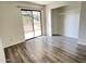 Bright bedroom featuring sliding glass doors to a balcony and walk-in closet at 4850 E Desert Cove Ave # 241, Scottsdale, AZ 85254
