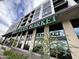 Modern apartment building features ground floor Whole Foods Market for resident convenience at 4850 E Desert Cove Ave # 241, Scottsdale, AZ 85254