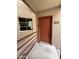 This is a front door view of unit 241 with a window next to the door at 4850 E Desert Cove Ave # 241, Scottsdale, AZ 85254
