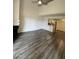 Bright and airy living room featuring wood flooring, fireplace, vaulted ceilings, and an open floorplan at 4850 E Desert Cove Ave # 241, Scottsdale, AZ 85254