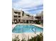 Sparkling community swimming pool with lounge chairs and shaded areas, perfect for relaxing outdoors at 4850 E Desert Cove Ave # 241, Scottsdale, AZ 85254