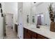 Bathroom with a vanity, a large mirror, and views into other rooms in the home at 6299 S Roanoke St, Gilbert, AZ 85298