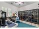 Bedroom showcasing a large collection of model cars displayed in glass cabinets at 6299 S Roanoke St, Gilbert, AZ 85298