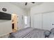 Cozy bedroom with a view to the ensuite bathroom and closet, offering comfort and convenience at 6299 S Roanoke St, Gilbert, AZ 85298