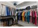 Walk-in closet with organized shelving and hanging space for clothing and accessories at 6299 S Roanoke St, Gilbert, AZ 85298
