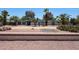 Stylish exterior elevation showcasing the home's desert landscaping and modern design at 6911 E Thunderbird Rd, Scottsdale, AZ 85254
