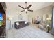 Comfortable living room with open floor plan, plush sofa, and inviting archways at 6911 E Thunderbird Rd, Scottsdale, AZ 85254