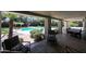 Comfortable patio space with outdoor seating overlooking the pool and garden area for relaxing and entertaining at 6911 E Thunderbird Rd, Scottsdale, AZ 85254