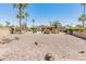 A kidney-shaped pool and desert landscaping highlight this generous backyard at 6931 E Pershing Ave, Scottsdale, AZ 85254