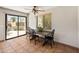 Cozy dining area with lots of light and a sliding glass door to the backyard at 6931 E Pershing Ave, Scottsdale, AZ 85254