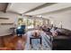 Living room with hardwood floors and pool access at 6931 E Pershing Ave, Scottsdale, AZ 85254
