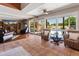 Living room with tile flooring and large windows at 6931 E Pershing Ave, Scottsdale, AZ 85254
