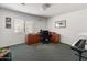 Bright office space features a large desk, comfortable chair, and ample natural light, ideal for a productive work environment at 6931 E Pershing Ave, Scottsdale, AZ 85254