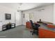 Home office with a desk, rolling chair, and a printer, offering a functional workspace at 6931 E Pershing Ave, Scottsdale, AZ 85254