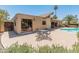 Inviting patio with ample seating, perfect for outdoor dining and relaxation by the pool at 6931 E Pershing Ave, Scottsdale, AZ 85254