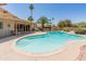 A private pool offers a perfect retreat amidst lush landscaping and serene surroundings at 6931 E Pershing Ave, Scottsdale, AZ 85254