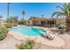 Backyard pool with diving board and patio area, perfect for outdoor relaxation and entertainment at 6931 E Pershing Ave, Scottsdale, AZ 85254