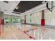Indoor basketball court featuring hardwood floors, high ceilings, and full-sized basketball hoops at 7120 E Kierland Blvd # 316, Scottsdale, AZ 85254