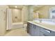 Well-lit bathroom features a shower-tub combination and sleek modern vanity at 7120 E Kierland Blvd # 316, Scottsdale, AZ 85254