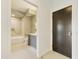 Stylish bathroom with tiled shower-tub and modern vanity, conveniently located near entry at 7120 E Kierland Blvd # 316, Scottsdale, AZ 85254