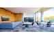 Relaxing common area with a bar, kitchen, and comfortable seating for residents at 7120 E Kierland Blvd # 316, Scottsdale, AZ 85254
