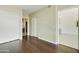 Spacious interior with closet, hardwood floors and an open view to the kitchen at 7120 E Kierland Blvd # 316, Scottsdale, AZ 85254