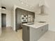 Modern kitchen featuring stainless steel appliances, gas cooktop, and a sleek, minimalist design at 7120 E Kierland Blvd # 316, Scottsdale, AZ 85254