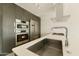 Close-up of a modern kitchen with stainless steel appliances, gas cooktop, and a sleek design at 7120 E Kierland Blvd # 316, Scottsdale, AZ 85254