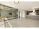 Bright living room with modern kitchen, large windows, and open floor plan at 7120 E Kierland Blvd # 316, Scottsdale, AZ 85254