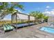 Contemporary poolside cabanas offer luxurious lounging with beautiful pool views on a large deck at 7120 E Kierland Blvd # 316, Scottsdale, AZ 85254