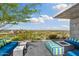 Relaxing rooftop patio features a firepit with seating and views of the surrounding golf course and landscape at 7120 E Kierland Blvd # 316, Scottsdale, AZ 85254